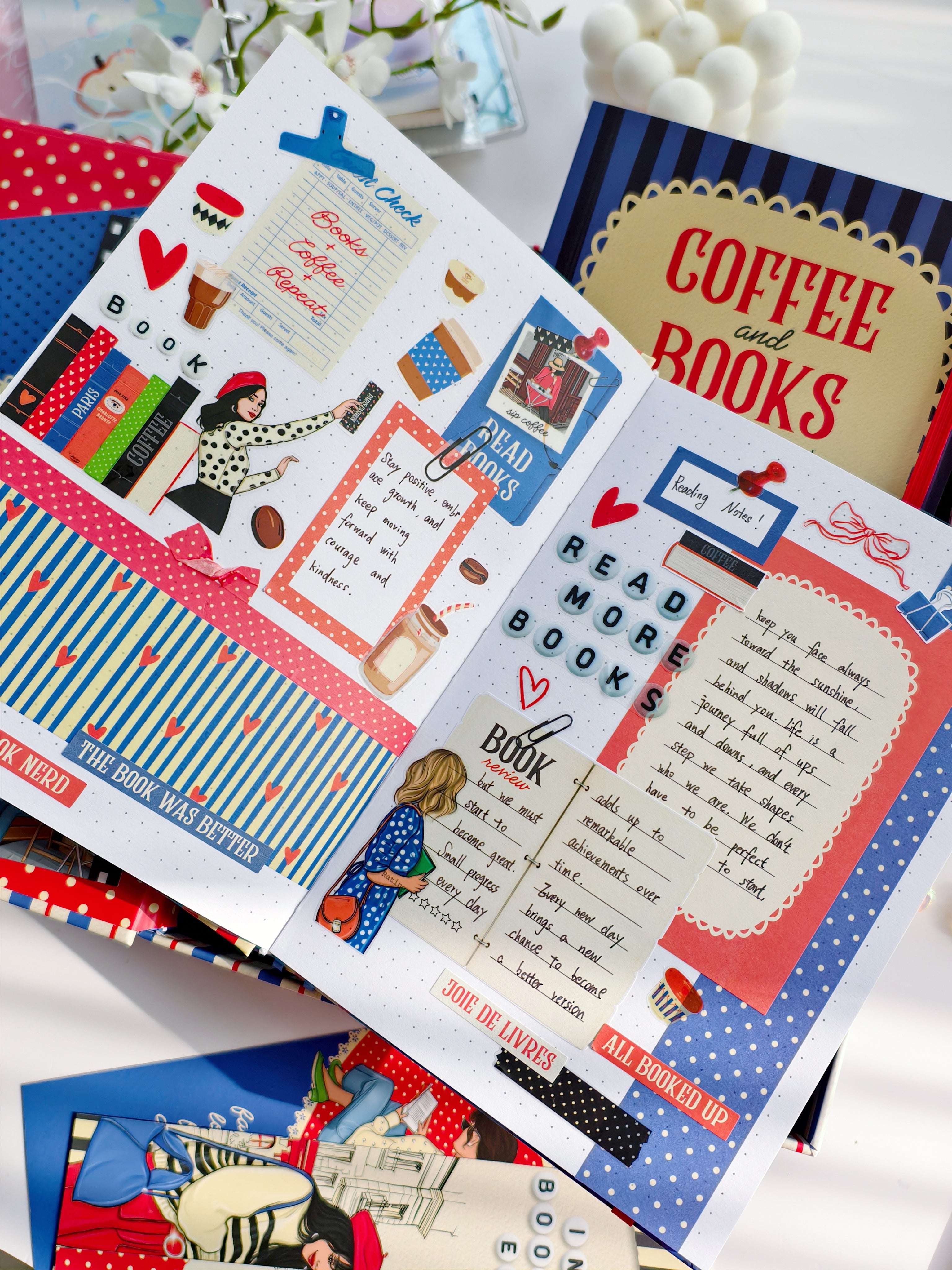 Open reading journal decorated with Coffee and Books stickers, layered journaling elements, reading notes, and Paris-inspired bookish artwork.