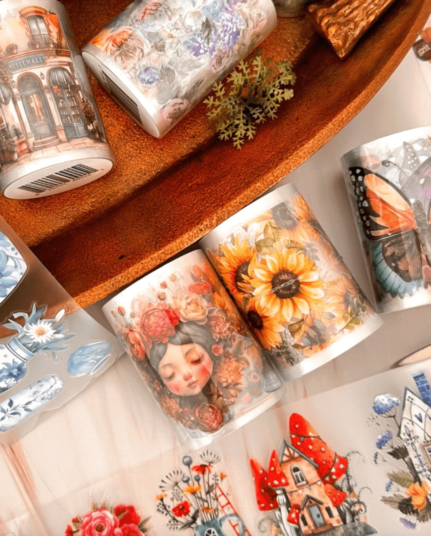 Washi tape rolls with floral, art, and sunflower designs. (Screenshot 2025)