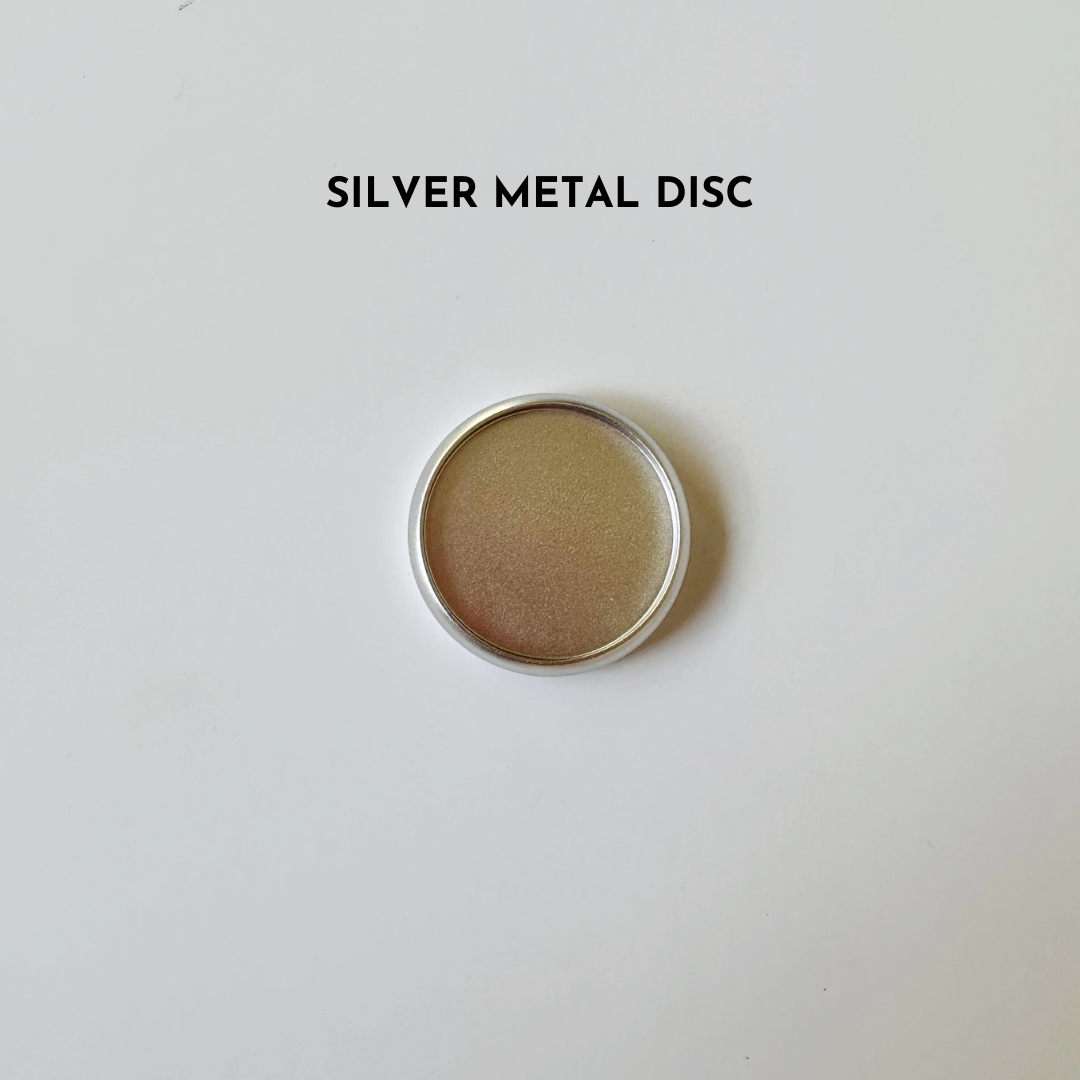 Silver metal disc