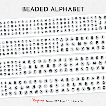 Beaded alphabet PET tape rolls arranged in rows on a white background.