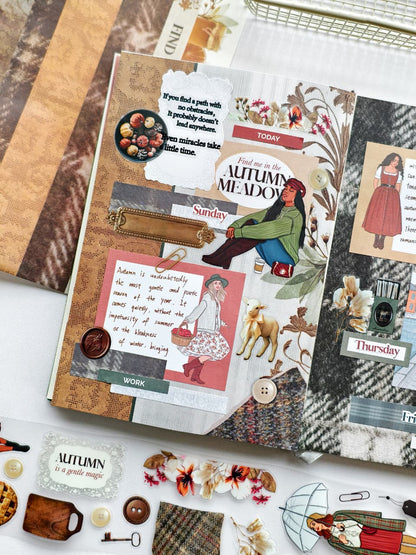 Close-up journal page decorated with Autumn Tales stickers featuring a seated girl in a green sweater, autumn quote cards, lamb illustration, floral elements, wax seals, and layered vintage textures.