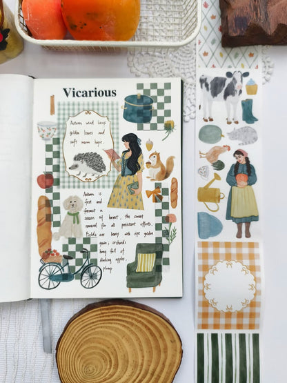 Cozy autumn journal spread decorated with Cozy Cottage Washi Tape featuring watercolor illustrations of a girl, hedgehog, squirrel, bicycle, dog, armchair, bread, and cottage-inspired accents in warm green and golden tones.