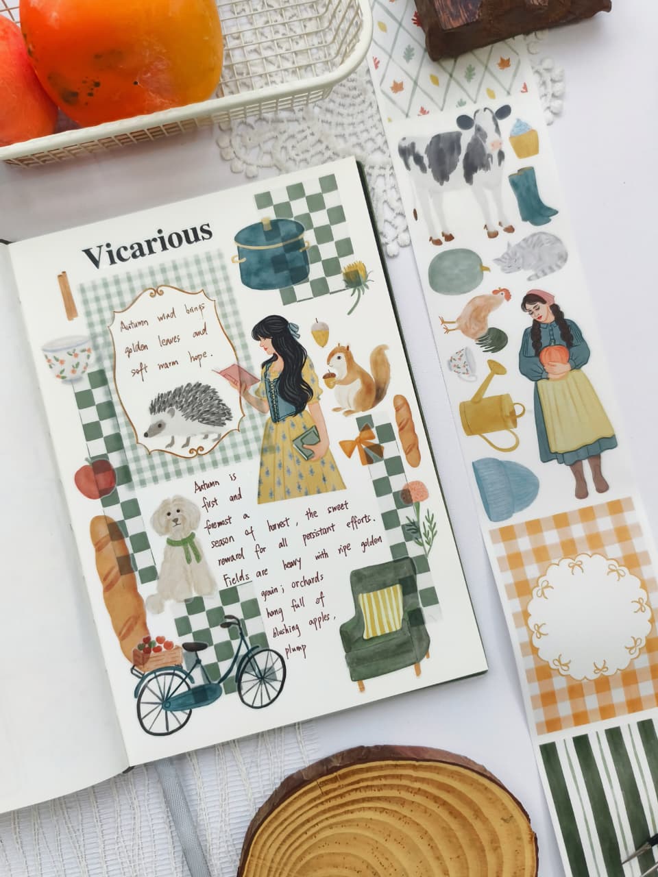 Angled view of a cozy cottage-inspired journal layout using Cozy Cottage Washi Tape with soft watercolor artwork, woodland animals, autumn harvest details, checkered patterns, and vintage home décor elements.