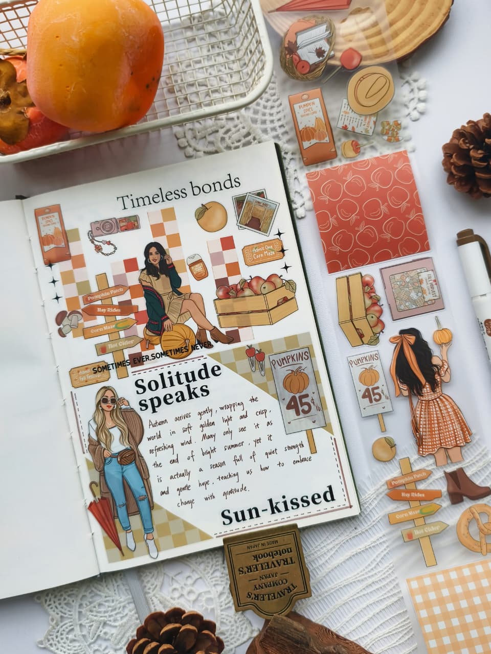 Angled view of a fall-themed journal spread decorated with Fall Festival PET Tape featuring pumpkin patch signs, apples, autumn fashion, seasonal ephemera, and cozy harvest-inspired illustrations.
