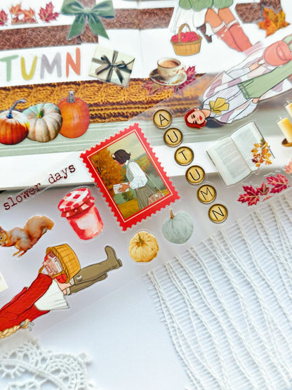 Close-up of Dear Autumn pre-cut PET stickers featuring autumn pumpkins, books, cozy drinks, fashion girls, stamps, and seasonal decorative elements.