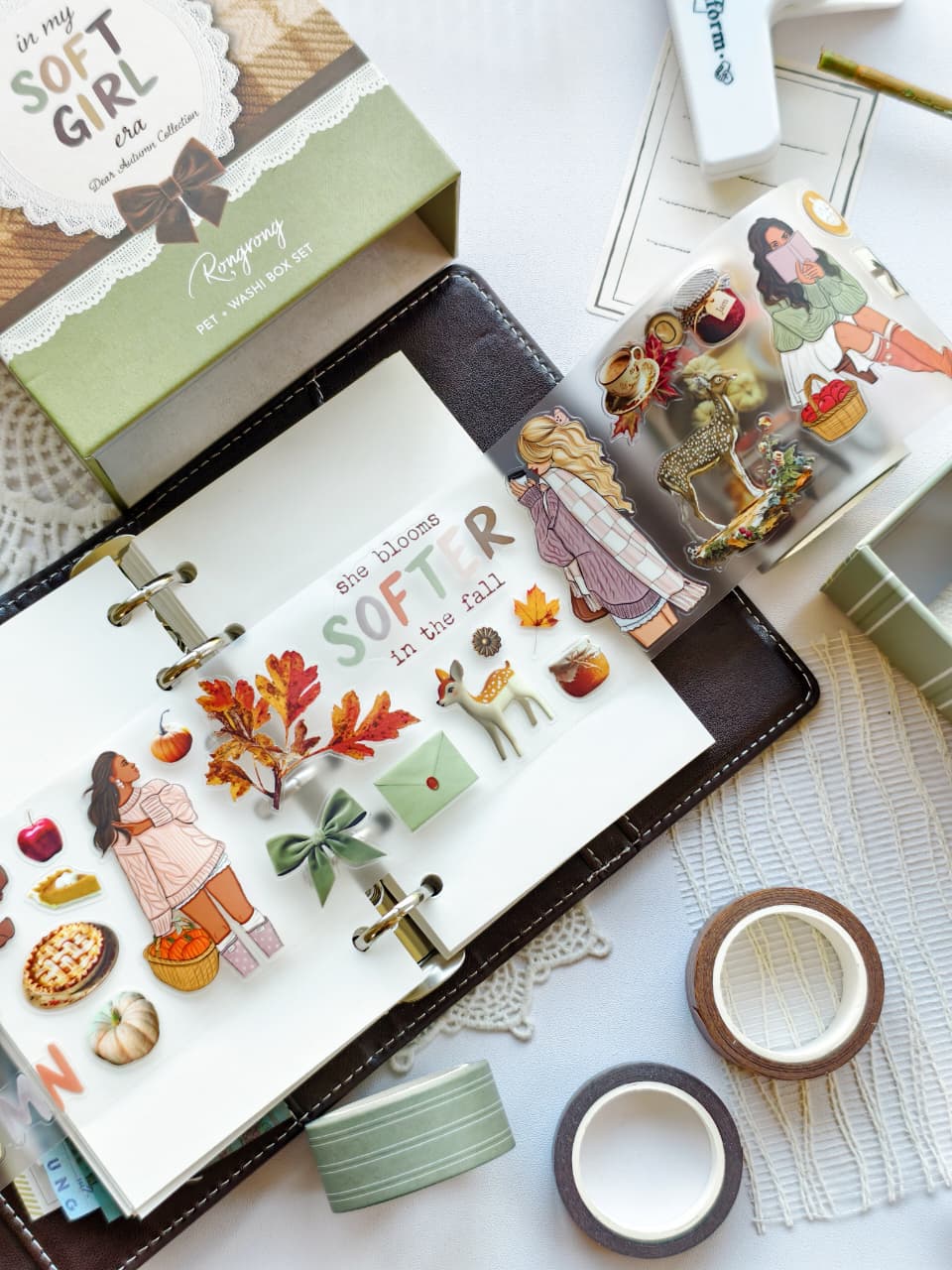 Dear Autumn pre-cut PET tape stickers and washi tapes decorating a planner spread with cozy fall illustrations, pumpkins, leaves, bows, and autumn-themed fashion girls.