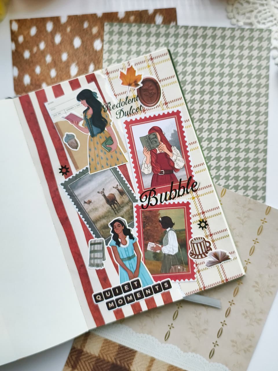 Handmade journal spread using Dear Autumn scrapbooking paper layered with bookish stickers, autumn illustrations, faux postage stamps, and cozy seasonal embellishments.