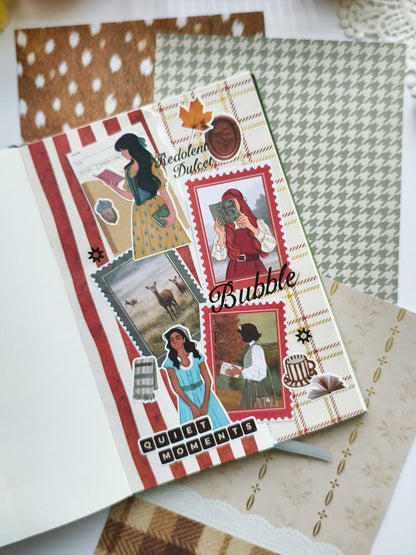 Handmade journal spread using Dear Autumn scrapbooking paper layered with bookish stickers, autumn illustrations, faux postage stamps, and cozy seasonal embellishments.