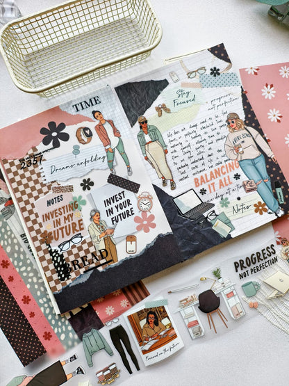 Close-up journal page featuring motivational stickers, professional women illustrations, watches, glasses, floral accents, and empowering messages about growth, goals, and investing in the future.