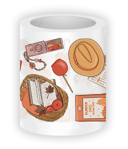 Close-up illustration from the Fall Festival PET Tape featuring a straw hat, caramel apple, pumpkin spice coffee, camera, and basket with books and apples in warm autumn colors.