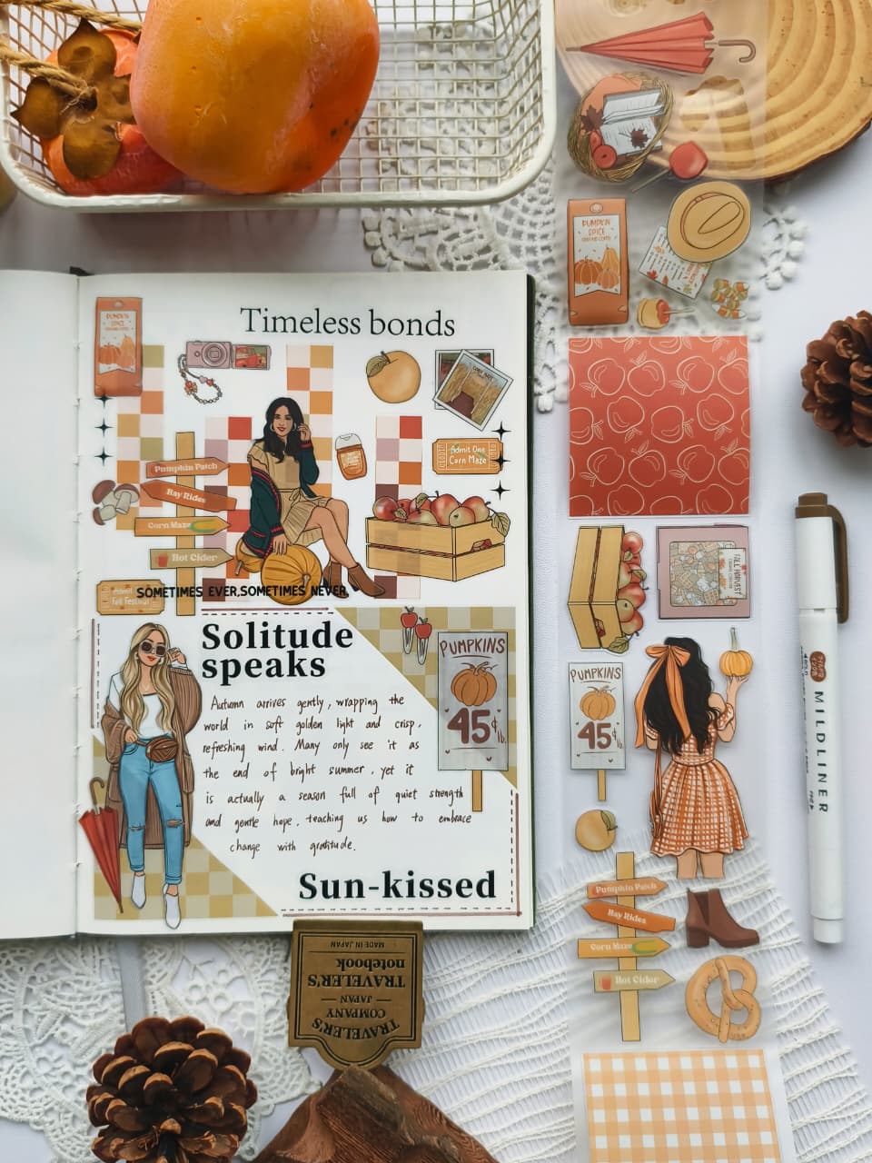 Open journal featuring a cozy autumn scrapbook spread decorated with Fall Festival PET Tape. The layout includes pumpkin patch illustrations, autumn girls, apples, warm drinks, and soft gingham accents in warm fall tones.