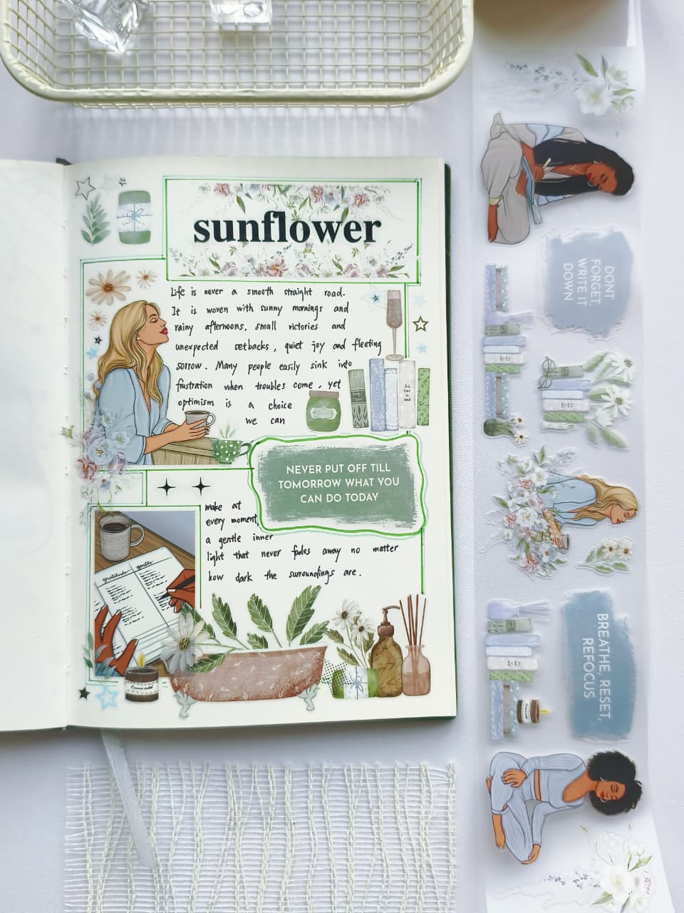 Flat lay of a journal decorated using Gentle Focus pre-cut PET tape with transparent self-care stickers, floral arrangements, books, wellness illustrations, and soothing green botanical accents.