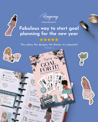 Goal planning book with stickers and planner on a blue background