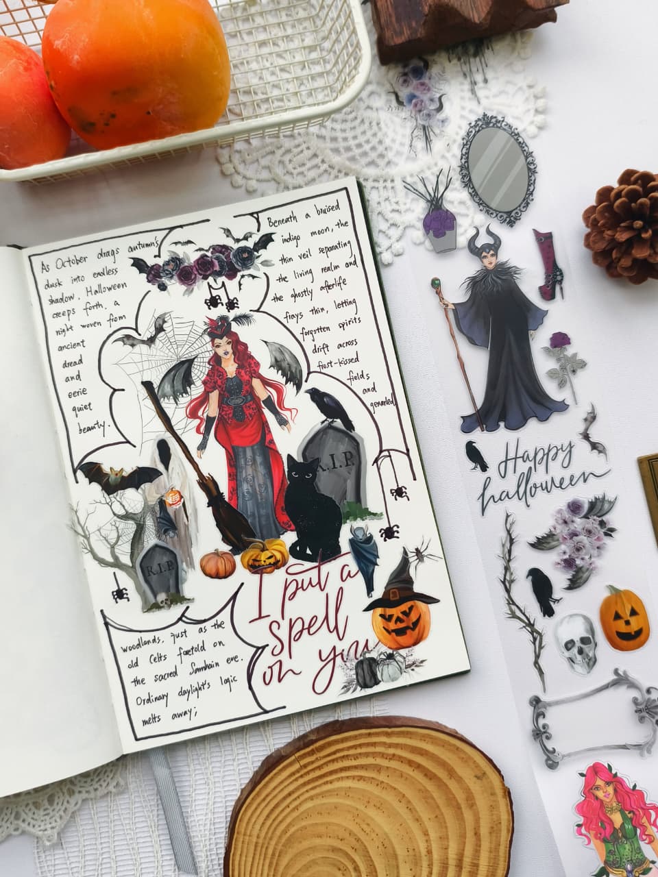 Angled view of a Halloween journal layout created with Chic Halloween PET Tape, featuring gothic artwork, spooky florals, ravens, pumpkins, and elegant Halloween decorations alongside coordinating PET tape illustrations.