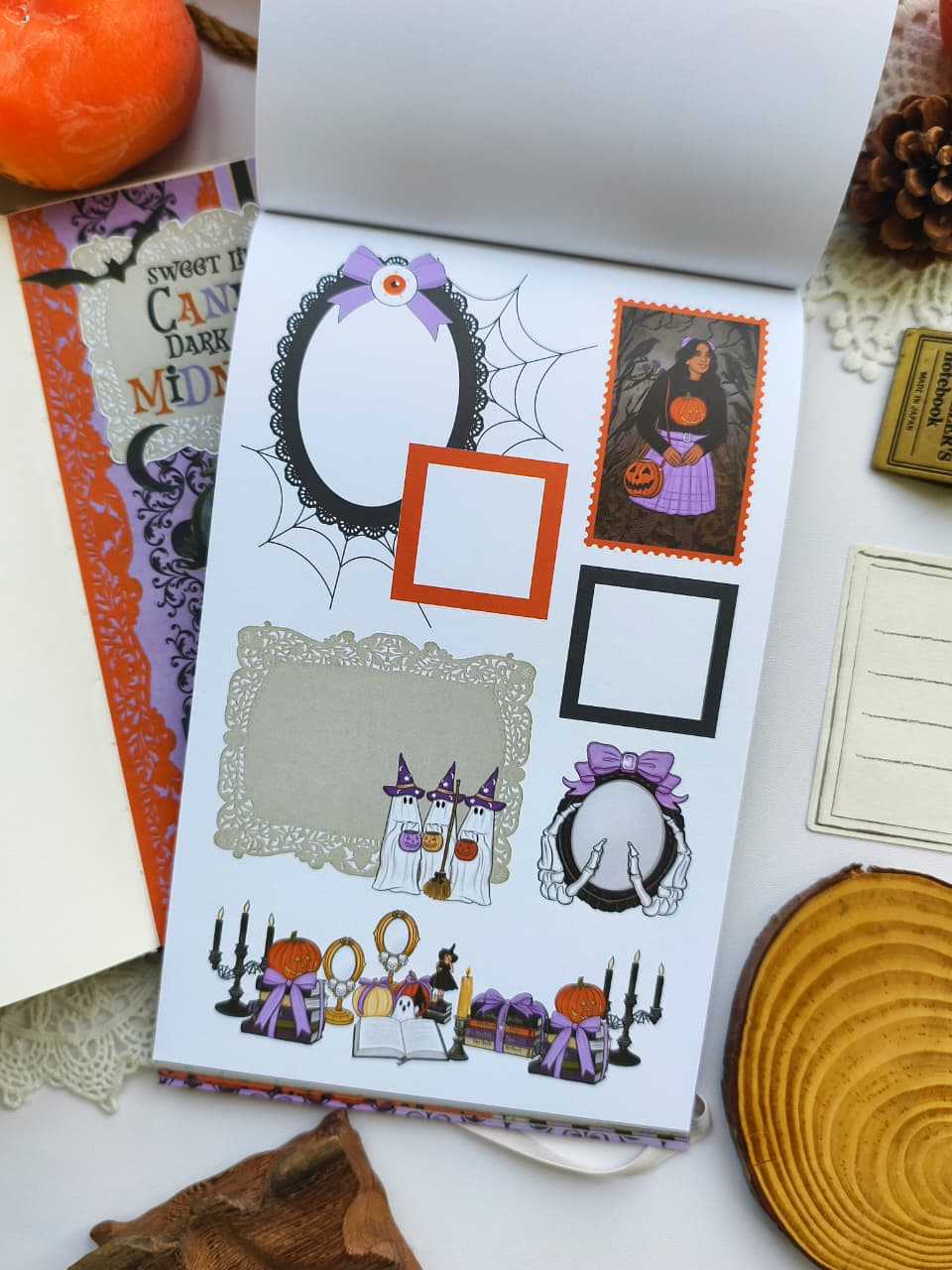 Functional Halloween sticker page featuring decorative frames, journaling labels, ghosts, pumpkins, ornate borders, photo frames, and spooky planner stickers in purple, orange, and black.