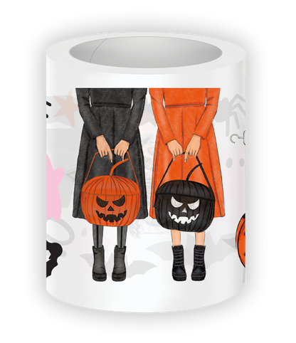Close-up illustration from the Hey Boo Pre-cut PET Tape featuring two girls holding orange and black pumpkin buckets with cute Halloween-inspired outfits and spooky accents.