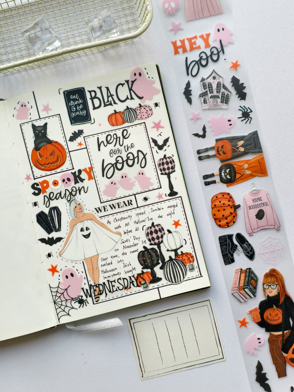 Creative Halloween journal layout showcasing pre-cut PET stickers with friendly ghosts, pumpkins, haunted house elements, bats, spiders, and stylish seasonal illustrations arranged around handwritten journaling.