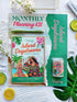 Complete Island Daydreams Monthly Planning Kit Bundle featuring a premium sticker book, tropical-themed washi tape, green pen, and island-inspired planner accessories with vibrant floral and beach vacation artwork.