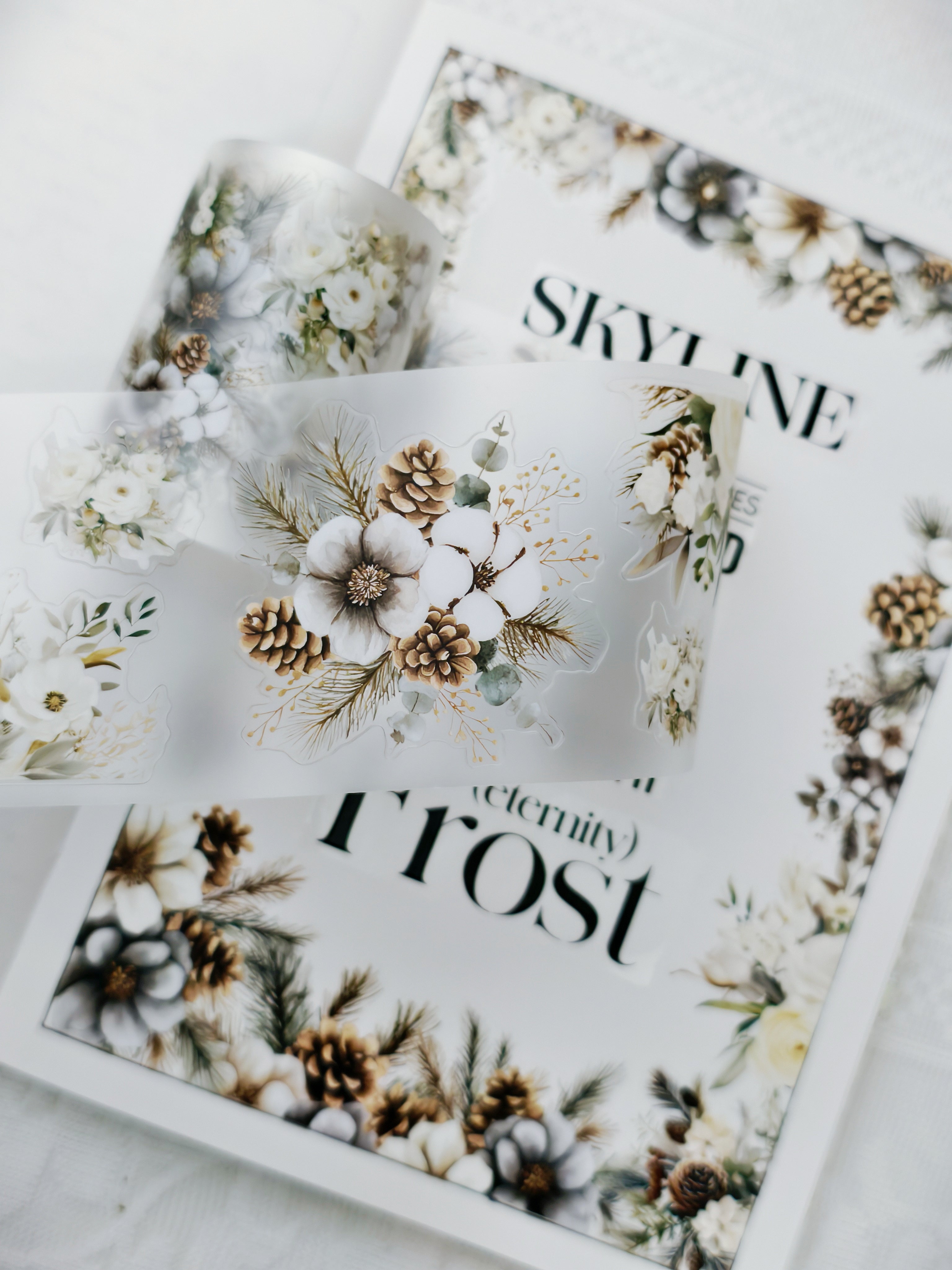 Pre-cut PET tape roll showcasing delicate ivory floral patterns