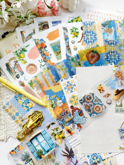 Decorative journal spread with Amalfi Coast theme, featuring lemons, florals, travel illustrations, and layered stickers in bright yellow, blue, and green tones.