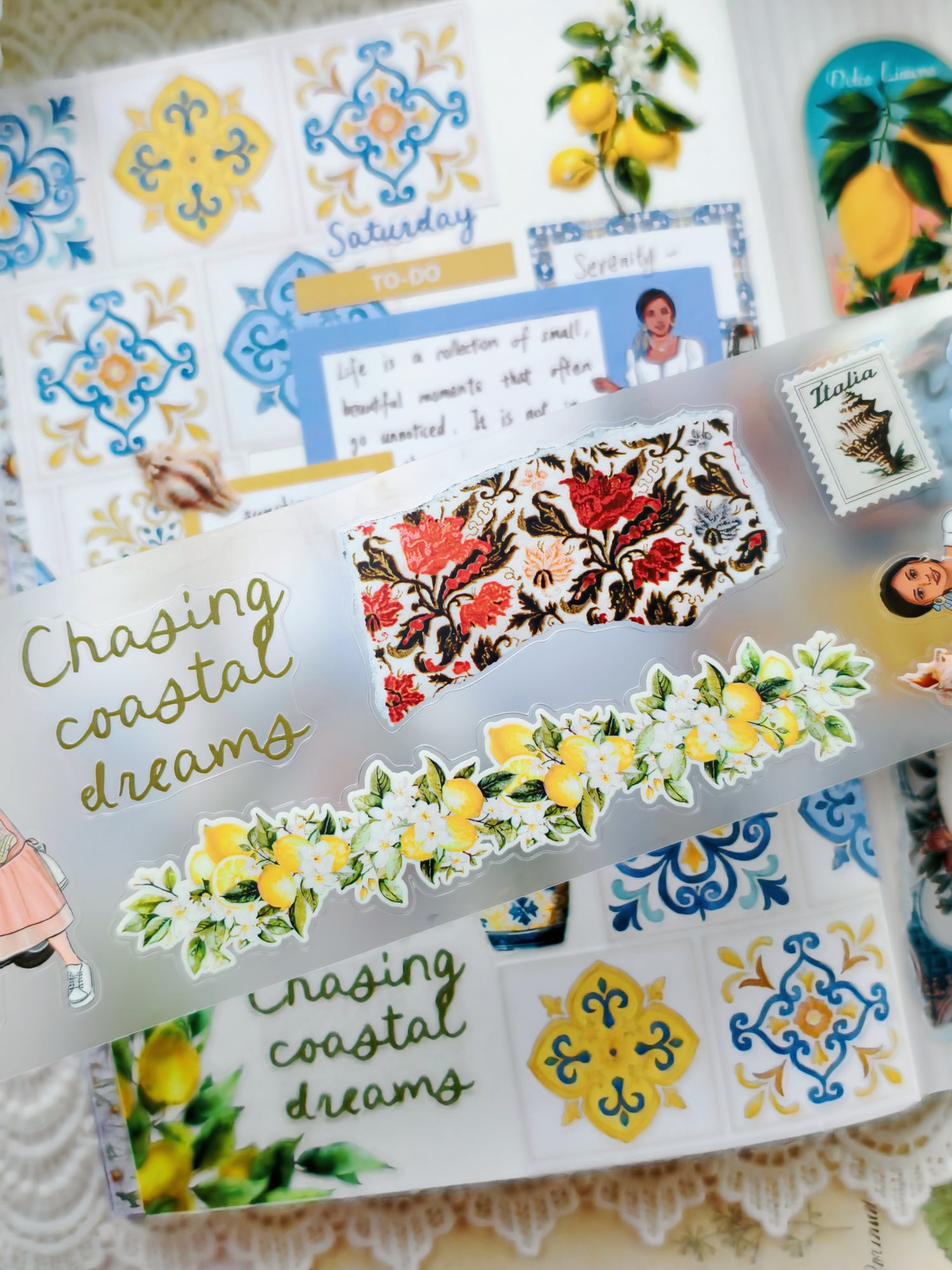 Clear sticker sheet featuring lemon florals, Italian-inspired patterns, and the phrase “Chasing coastal dreams” on a soft aesthetic background.