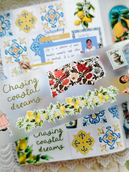 Clear sticker sheet featuring lemon florals, Italian-inspired patterns, and the phrase “Chasing coastal dreams” on a soft aesthetic background.