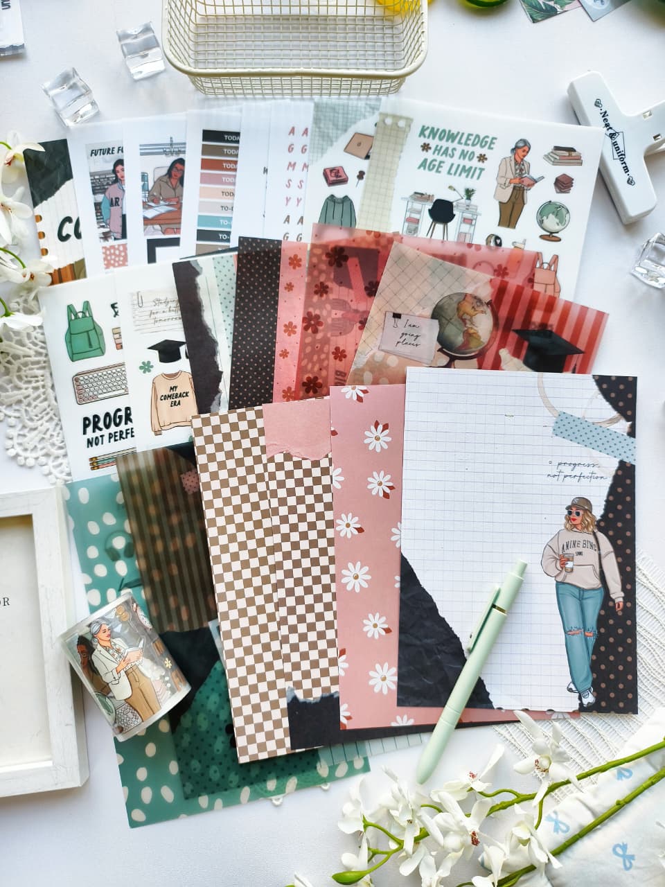 Flat lay of the My Comeback Era collection featuring journaling papers, PET tape, sticker sheets, motivational quotes, career-themed illustrations, office accessories, and soft pink, sage green, and neutral color palettes.
