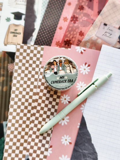 My Comeback Era PET tape roll displayed on a flat lay with pink daisy-patterned paper, checkerboard and grid backgrounds, translucent floral overlays, and a sage green pen, showcasing a modern productivity and personal growth aesthetic.