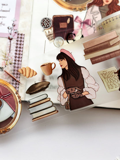 Detailed PET tape design featuring a fashionable woman in a pink beret, coffee cup, croissant, books, handwritten letters, and vintage Paris-inspired stationery elements.