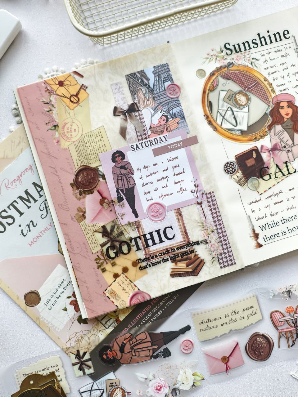 Romantic planner spread decorated with Postmarked in Paris stickers featuring vintage letters, wax seals, florals, Paris-inspired illustrations, feminine fashion elements, and soft blush and cream tones.