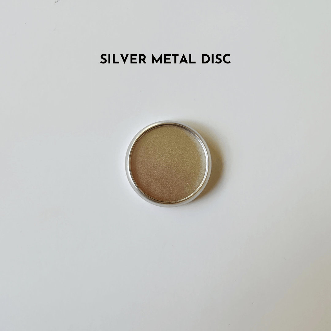 Silver metal disc