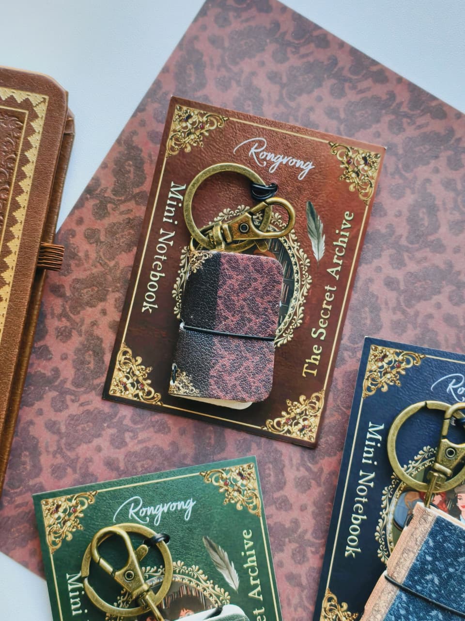 The Secret Archives Mini Notebook Charm Rust (Ships around Oct. 1st)