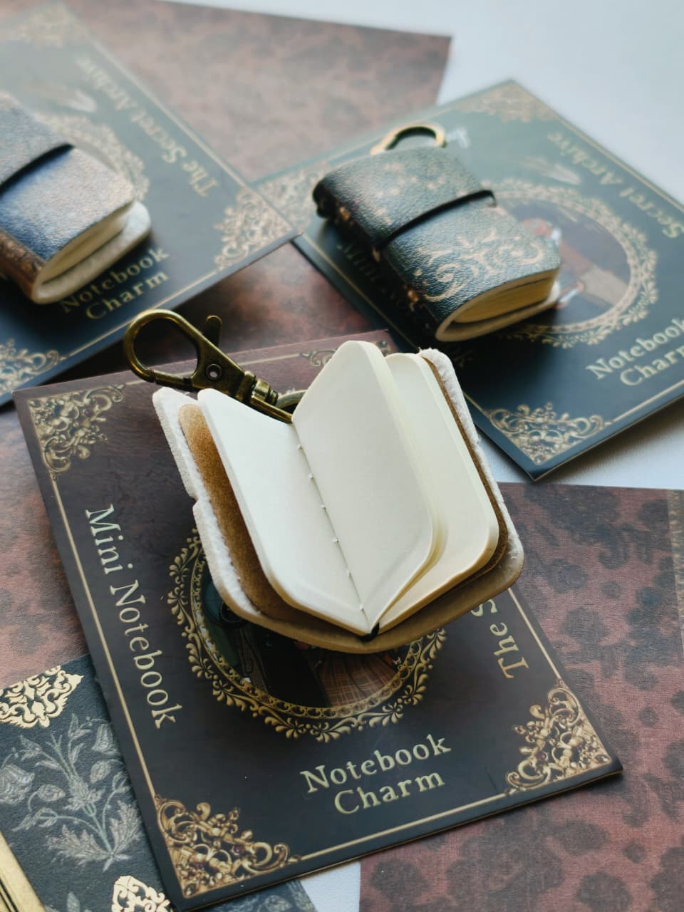 The Secret Archives Mini Notebook Charm Rust (Ships around Oct. 1st)