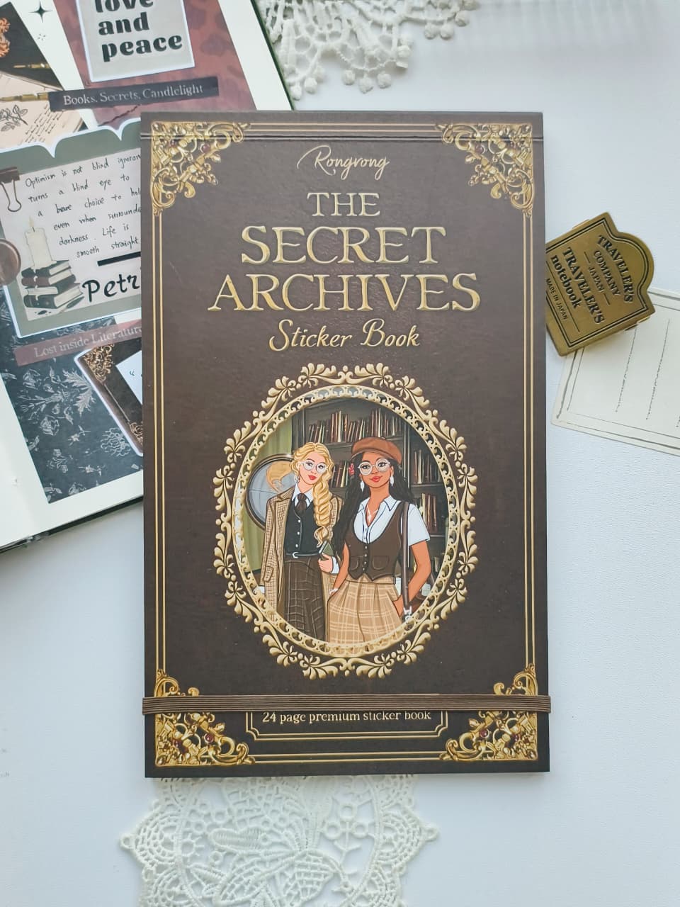 The Secret Archives Dark Academia Sticker Book featuring vintage library inspired planner stickers.