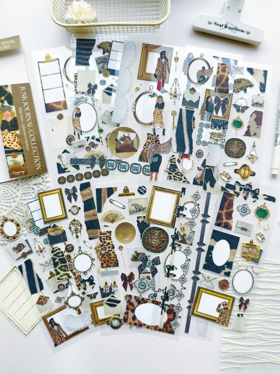 Multiple leopard-print and vintage-inspired transparent sticker sheets featuring fashion girls, ornate frames, jewelry, bows, and animal-print elements.