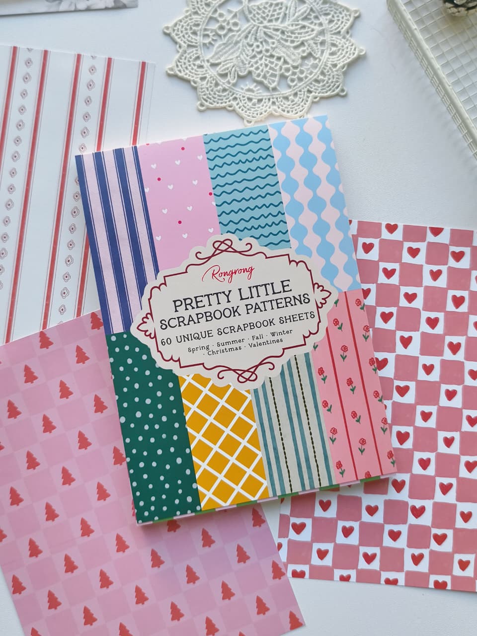 Pretty Little Scrapbook Patterns paper book featuring 60 unique scrapbook sheets for spring, summer, fall, winter, Christmas and Valentine’s
