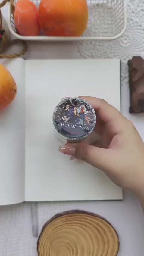 Watch a Halloween Plan With Me featuring the Chic Halloween PET Tape collection. The video showcases transparent die-cut PET tape with gothic witches, ravens, pumpkins, black cats, skulls, gravestones, florals, and elegant Halloween accents as they're layered into a spooky journal spread. Perfect for scrapbooking, planners, memory keeping, and seasonal journaling.