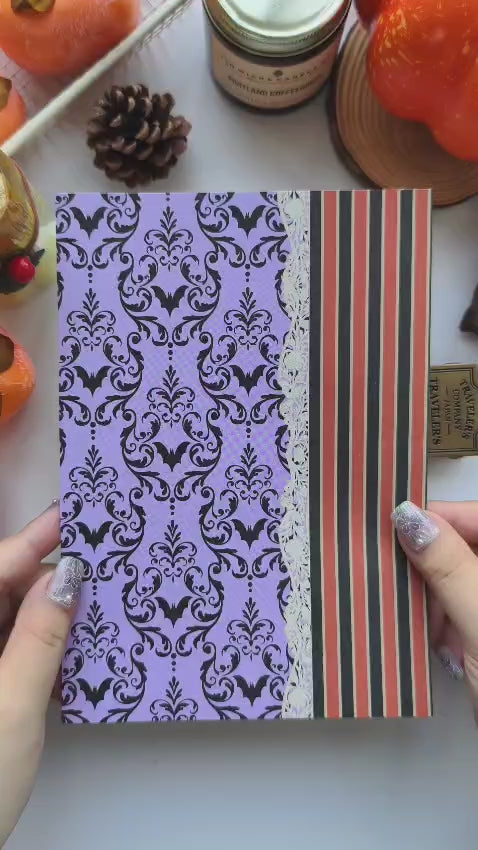 Plan With Me video featuring the Happy Haunts Scrapbooking Paper collection as layered backgrounds for a cozy Halloween-themed journal spread with faux postage stickers, gold foil papers, autumn colors, and spooky elegant embellishments for memory keeping and paper crafting.