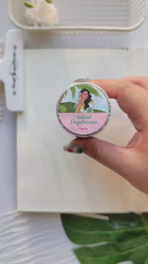 Video showcase of the Island Daydreams Monthly Planning Kit Bundle featuring tropical journal spreads, layered planner stickers, island-inspired artwork, floral ephemera, and aesthetic vacation-themed stationery accessories.