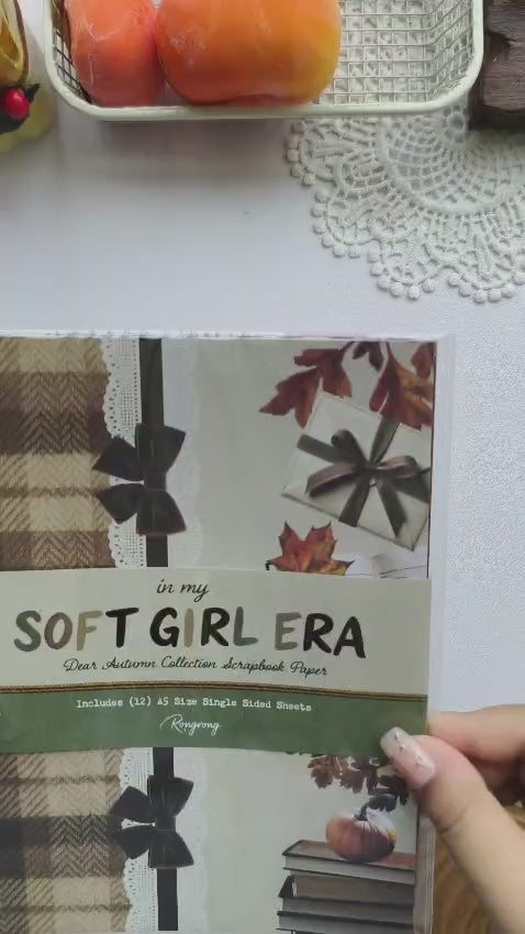 Unboxing video featuring the Dear Autumn Scrapbooking Paper collection with cozy plaid patterns, botanical designs, knit textures, library-inspired prints, gold foil accents, and vintage autumn papers for scrapbooking, journaling, and paper crafting.