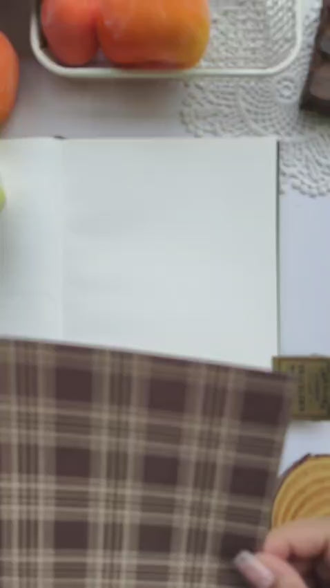 Plan With Me video using the Dear Autumn Scrapbooking Paper collection to create a layered autumn journal spread featuring plaid backgrounds, vintage-inspired embellishments, reading-themed stickers, cozy fall colors, and seasonal paper crafting ideas.