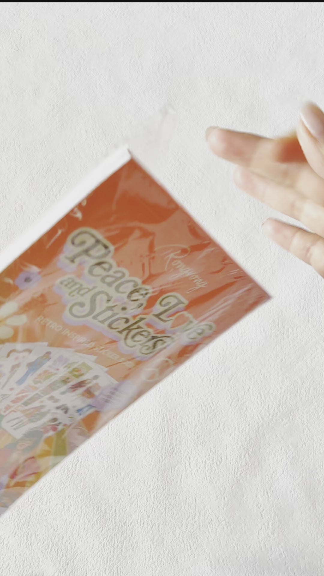 Brief video showcasing the sticker book, flipping through pages filled with colorful and expressive stickers.