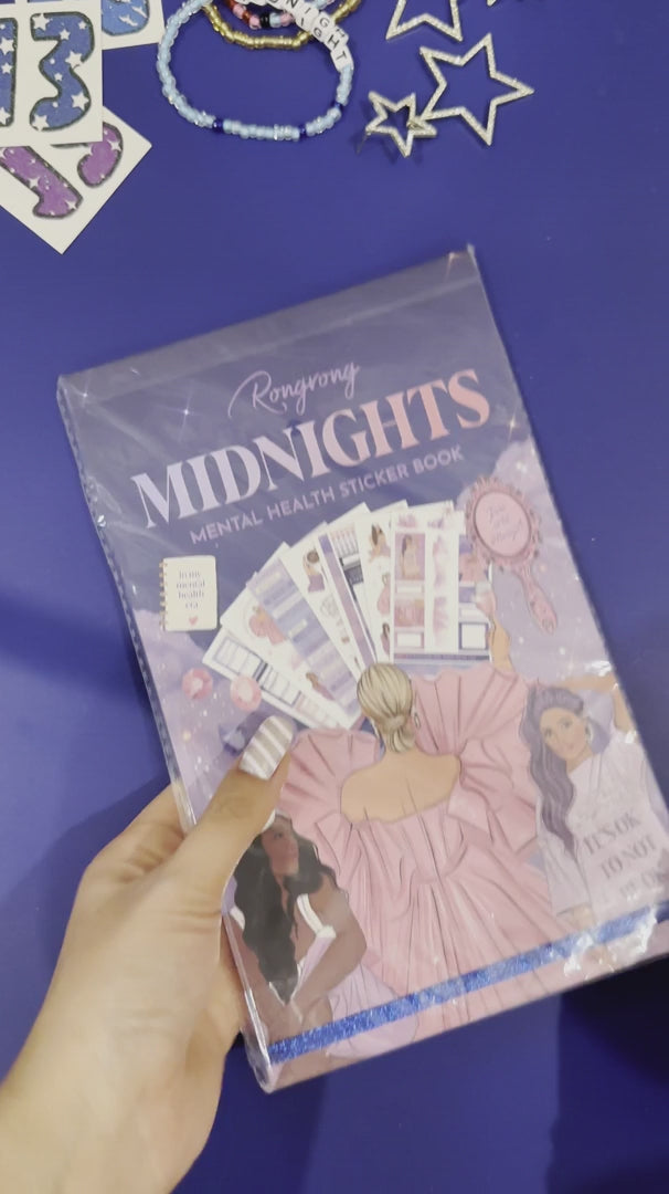 Video showcasing the Midnight Sticker Book, flipping through pages filled with thoughtful designs and uplifting stickers.